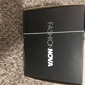 Cute wedge heel - never worn black with gold accents from Fashion Nova